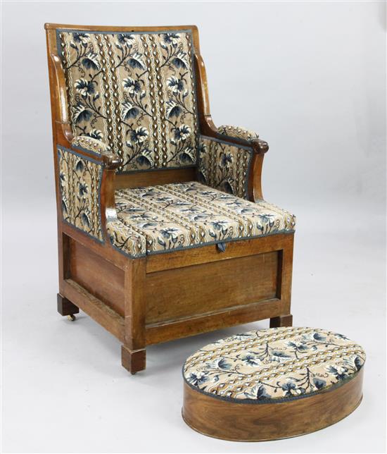 A 19th century French walnut commode chair, with an oval footstool, W.2ft 1in. H.3ft 6in.